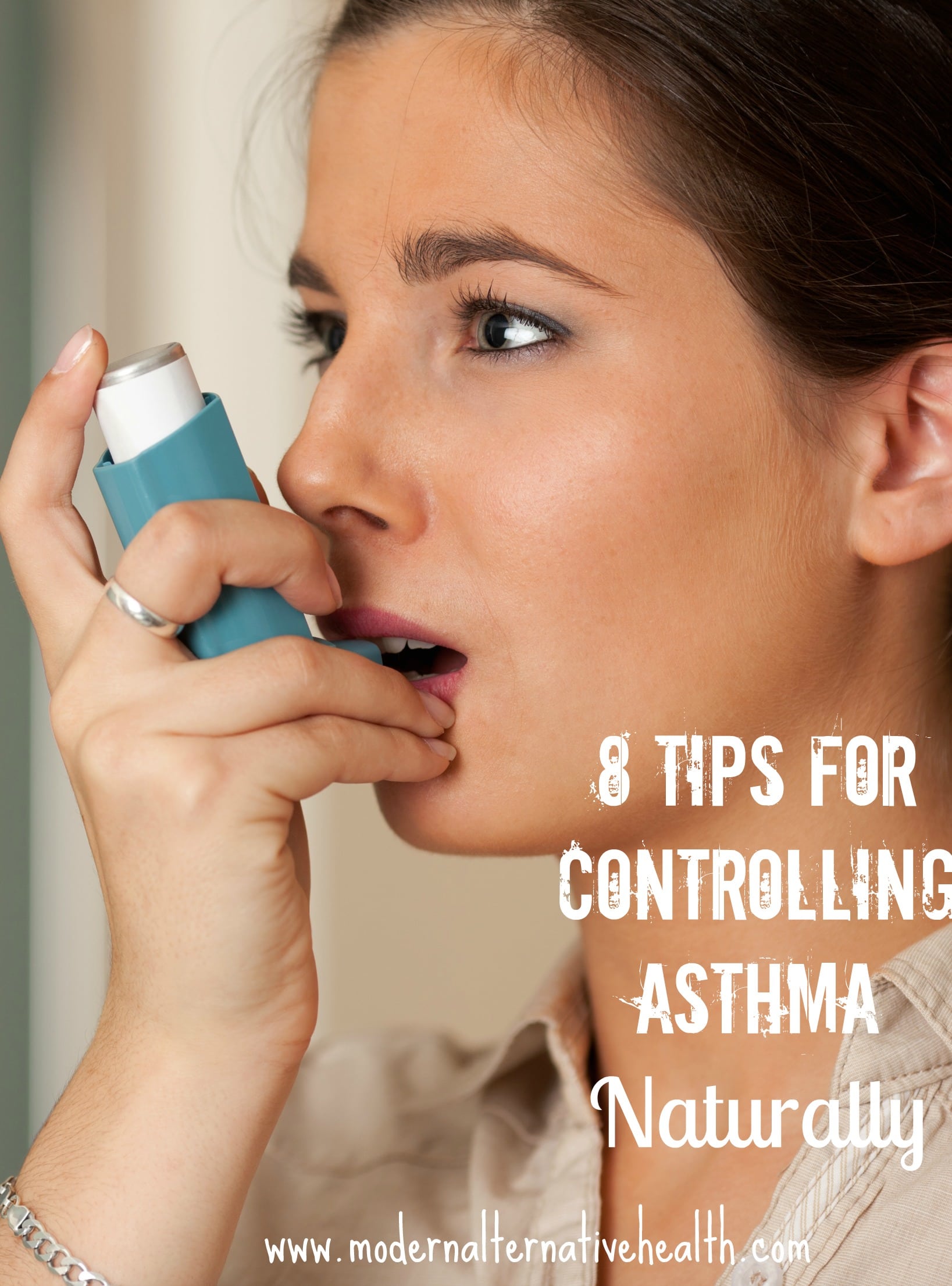 Young woman using asthma inhaler.