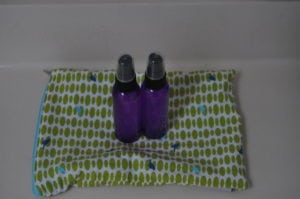 Plastic bottles with solution for the diaper bag- placed in a small wet bag with cloth wipes to prevent leakage in the bag.
