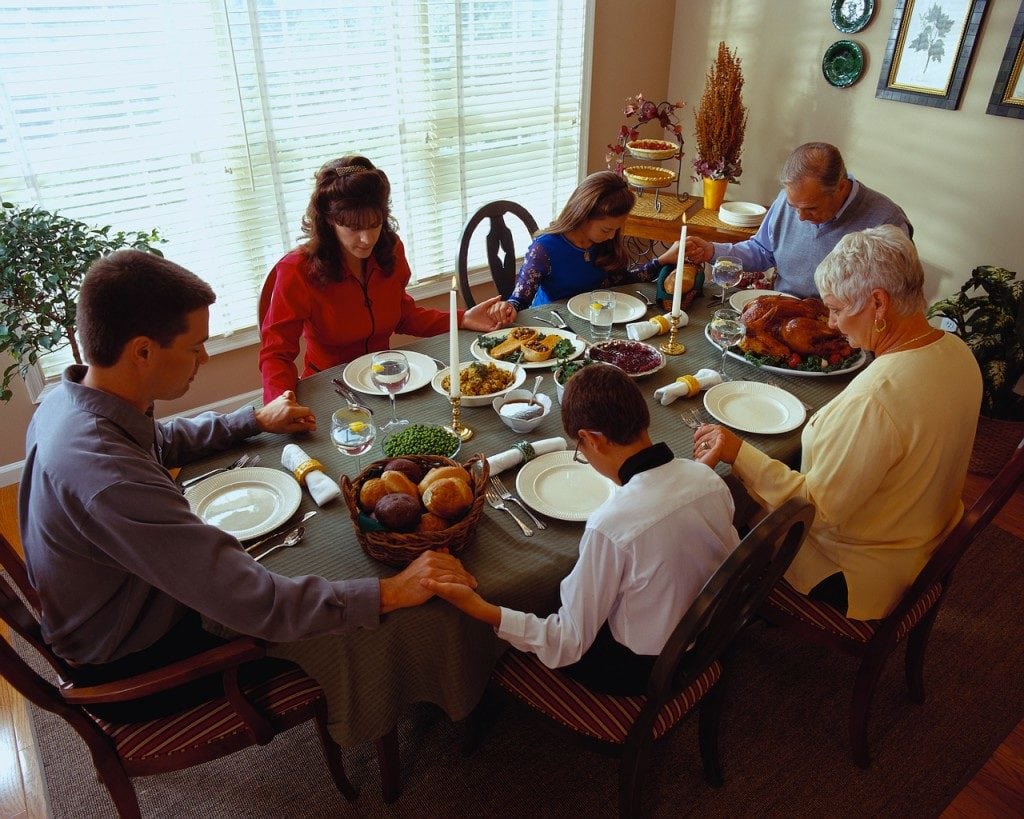 Family Praying Before Dinner ca. 2001